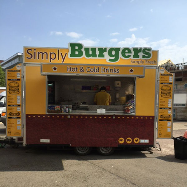Mobile food unit selling burgers